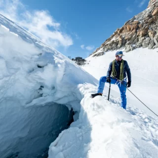 IFMGA mountain guide teaching crevasse rescue techniques on a glacier in Chamonix