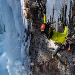 Alpine ice climbing in Valsavarenche with views of the Gran Paradiso massif.