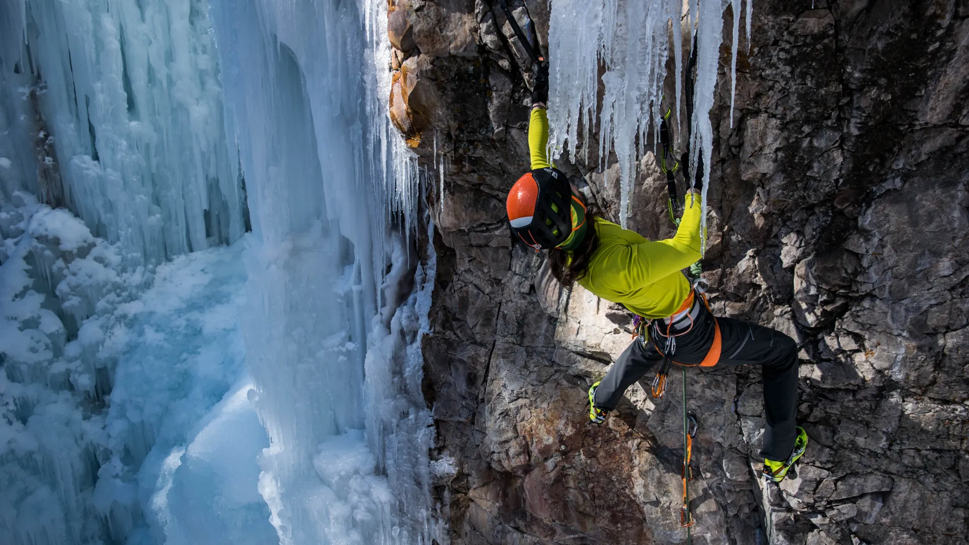 Alpine ice climbing in Valsavarenche with views of the Gran Paradiso massif.