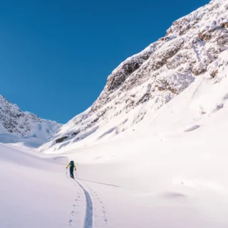 High-mountain traverse with views of the Matterhorn in the distance