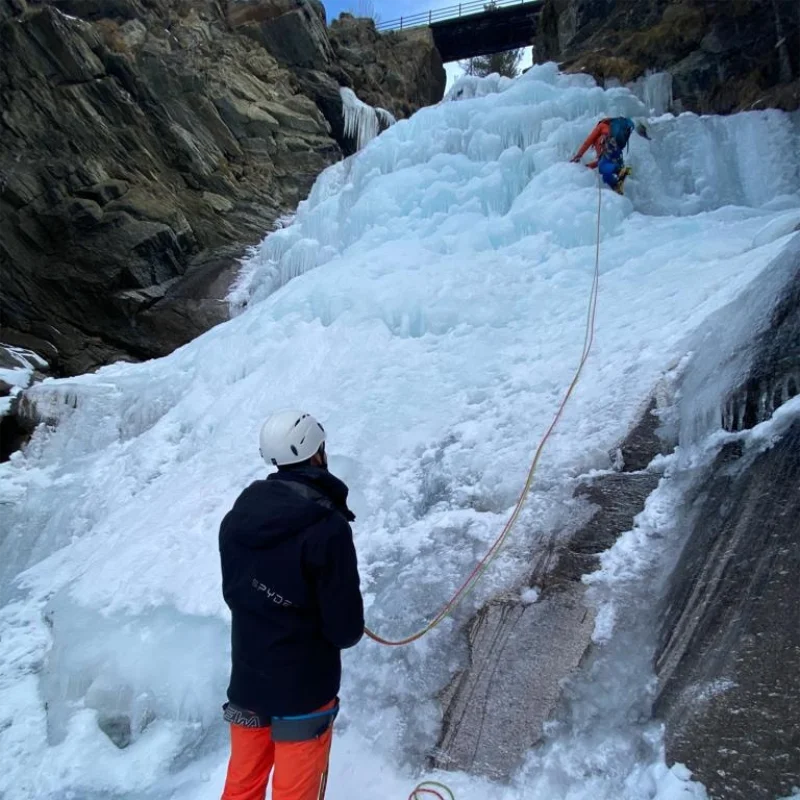 Vertical ice route in Valeille climbed by a guided group in Aosta Valley.
