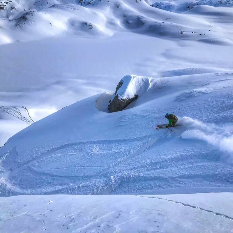 Skier navigating deep snow in the Mont Blanc massif