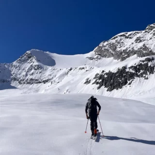 Ski tourer ascending the slopes of Gran Paradiso