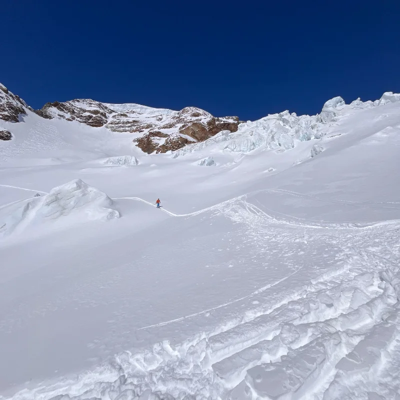 Group skiing through the Gran Paradiso National Park