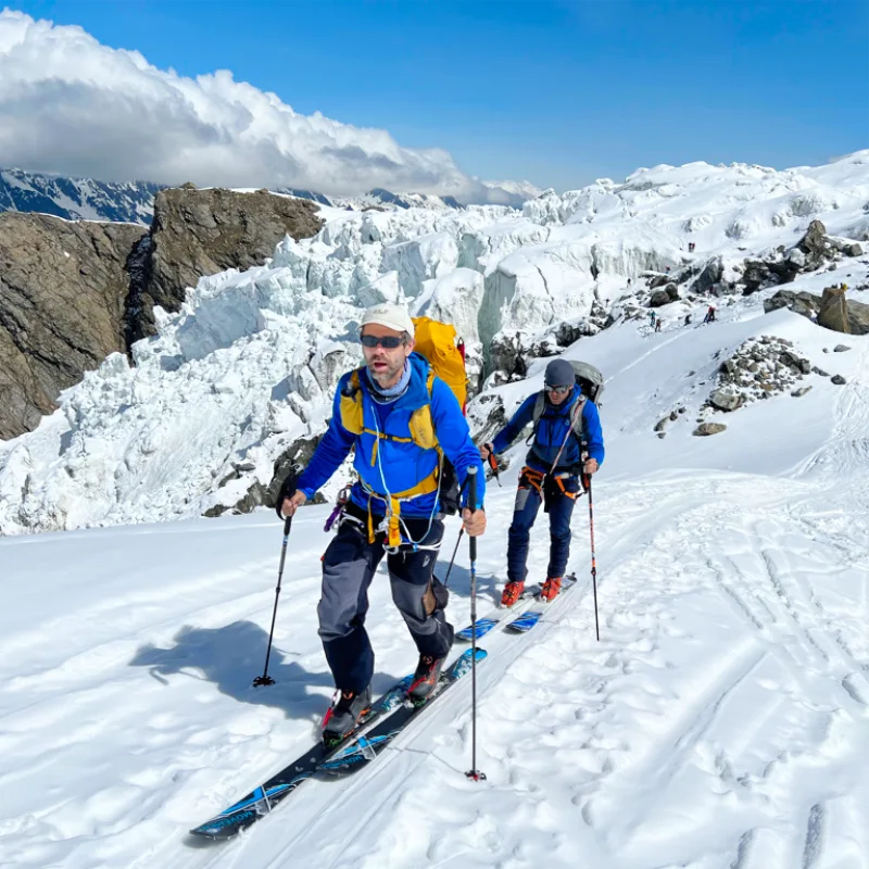 IFMGA guide leading a team on the ski ascent of Mont Blanc