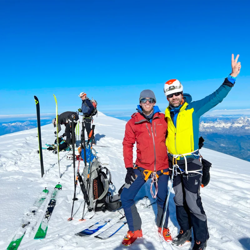 Skiers climbing toward the summit of Mont Blanc at sunrise