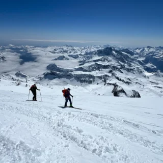 Ski touring party approaching a mountain hut in the Monte Rosa region
