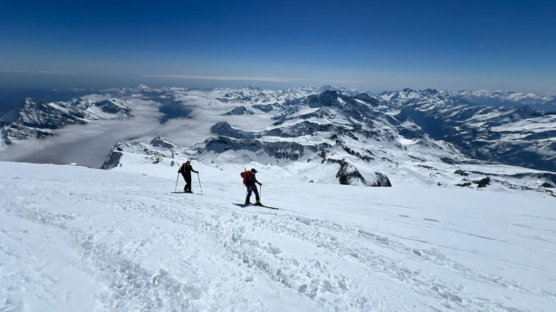 Ski touring party approaching a mountain hut in the Monte Rosa region