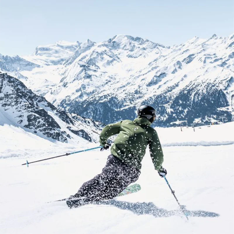 Descent from a high alpine ridge in the Verbier freeride zone
