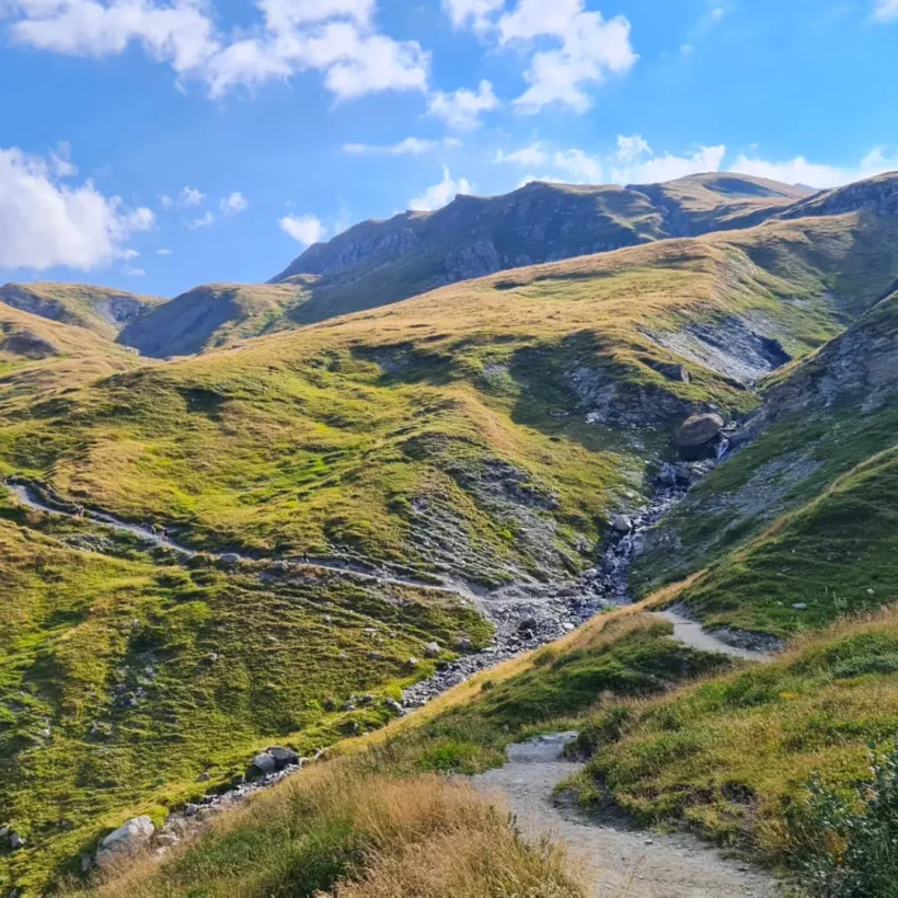 Panoramic hiking route around Mont Blanc with glaciers and peaks in the distance